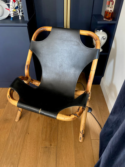 Bamboo and leather armchair with shoulder strap - circa 1960.