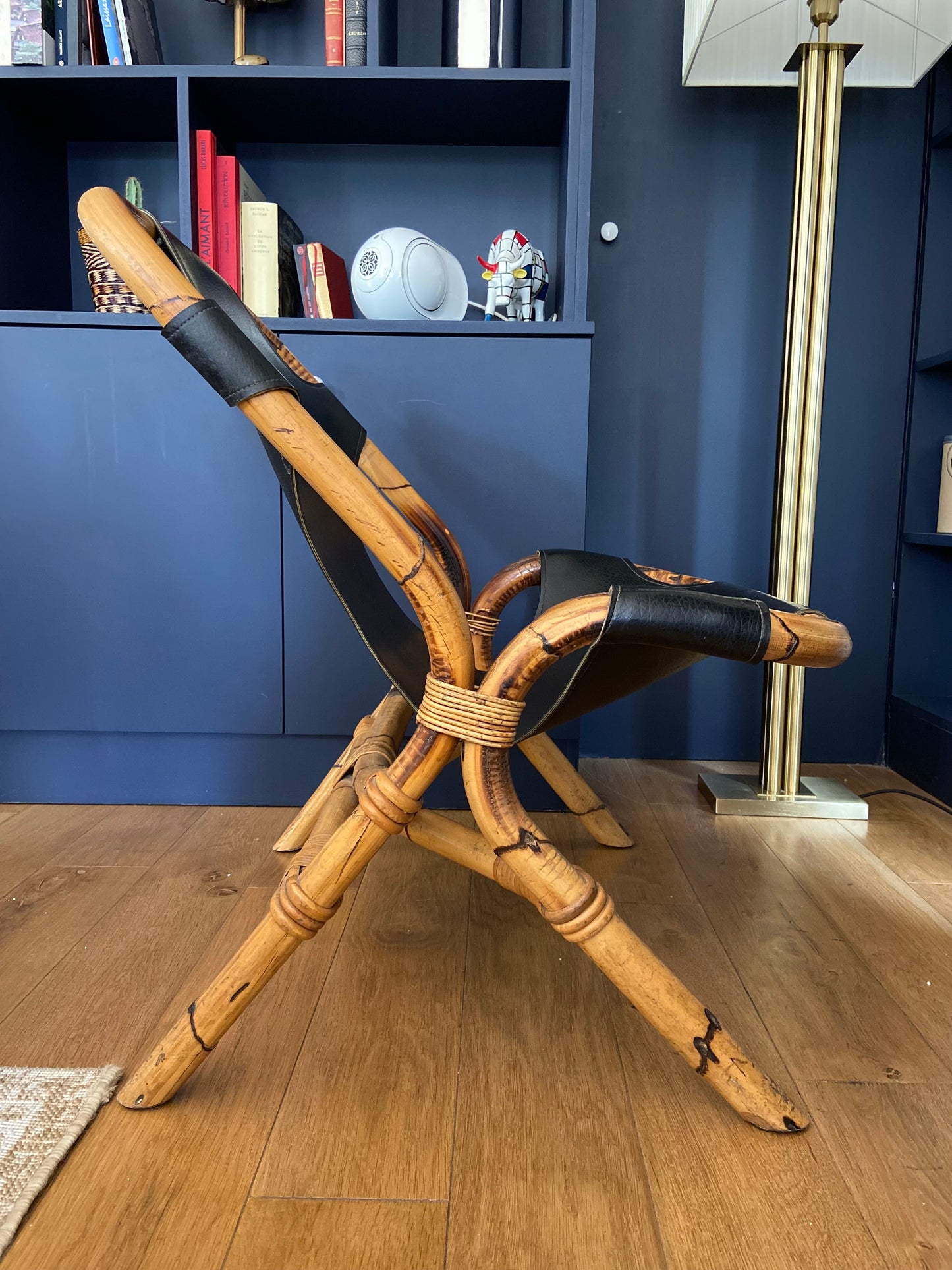 Bamboo and leather armchair with shoulder strap - circa 1960.