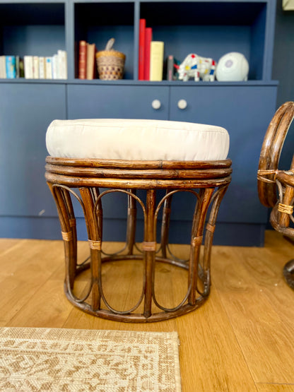 Swivel rattan armchair and footrest - circa 1960.